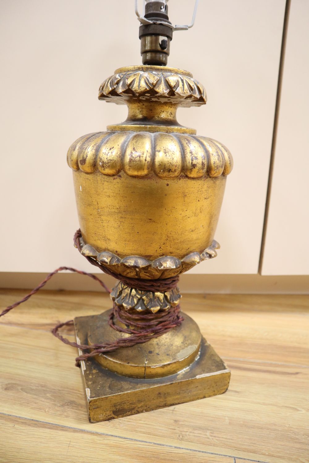 A gilt wood and composite table lamp, height 37cm